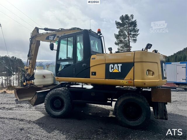 Riteņu ekskavators CAT M316D