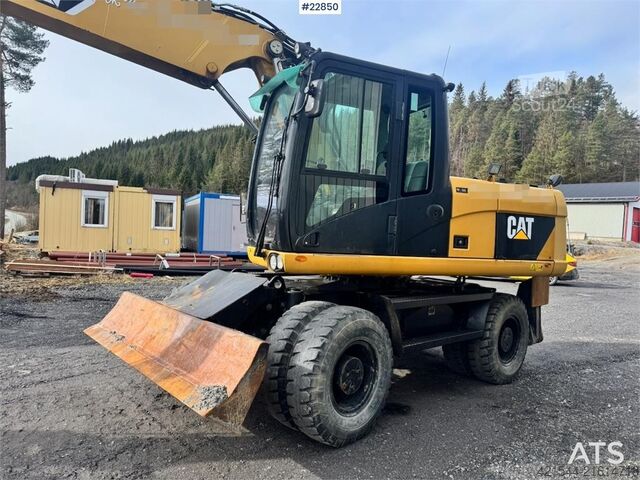 Riteņu ekskavators CAT M316D