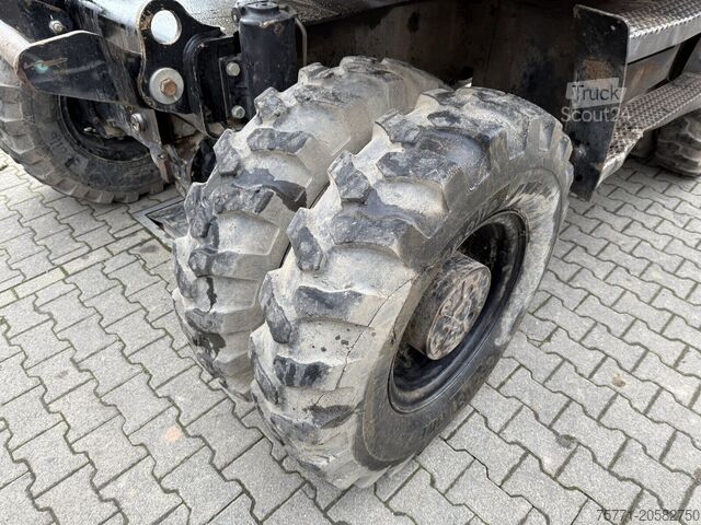 Kerekes földkiemelő gép Caterpillar M318D KOPARKA KOŁOWA