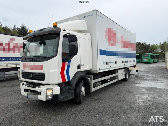 Matkalaukku Volvo FL 4x2 box truck with a 1500 kg lift and remote co