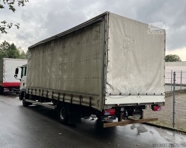 Flatbed truck with tarp MAN TGL 12.220 Pritsche + Schiebeplane AHK Klima