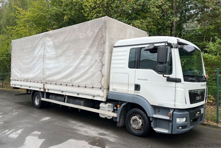 Flatbed truck with tarp MAN TGL 12.220 Pritsche + Schiebeplane AHK Klima