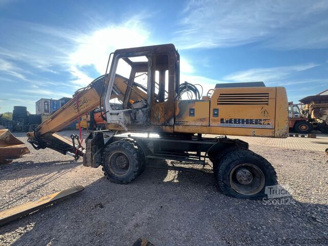 Excavadora sobre neumáticos Liebherr A904 Litronic