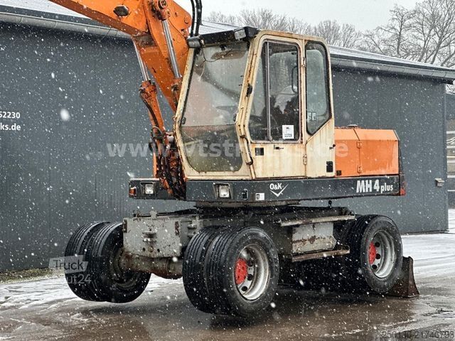 Ratinis ekskavatorius O&K MH4 Plus Mobilbagger inkl. Schalengreifer