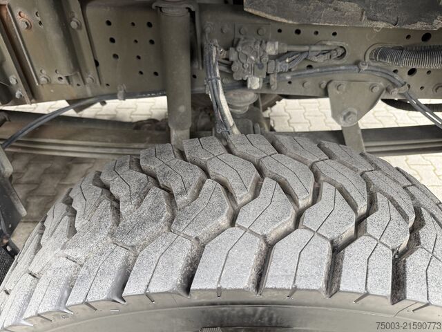 Flatbed truck with tarp Iveco EuroTrakker 190E35W 4X4 Ex Armee