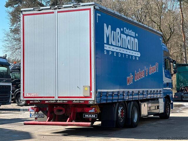 Вантажівка з платформою і тентом MAN TGX 26.440 6x2 BL Plane & Retarder /EDSCHA