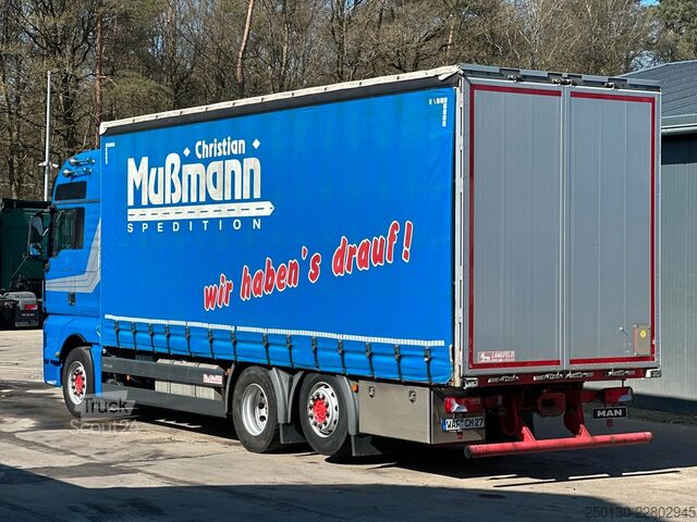 Вантажівка з платформою і тентом MAN TGX 26.440 6x2 BL Plane & Retarder /EDSCHA