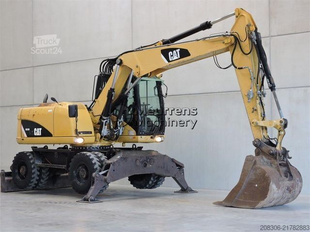 Excavator pe roți CATERPILLAR M313
