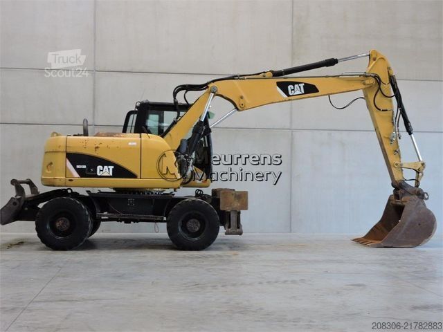 Excavator pe roți CATERPILLAR M313