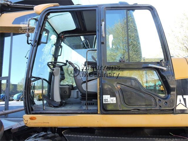 Excavator pe roți CATERPILLAR M313