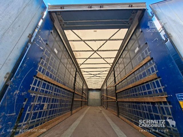 Avoin puoliperävaunu pressulla Kögel Curtainsider Mega