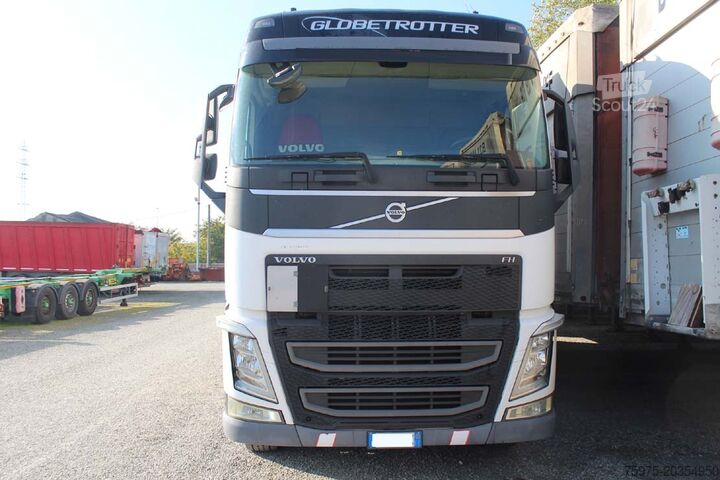 Camion scarrabile Volvo FH12 460 motrice porta casse mobili usat