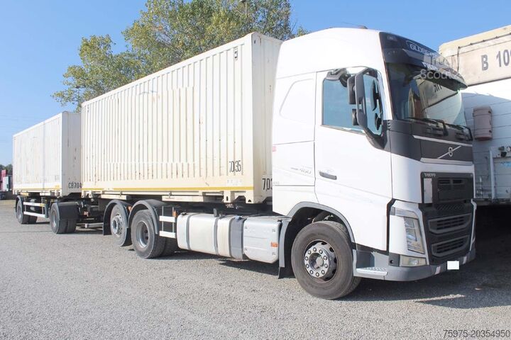 Camion scarrabile Volvo FH12 460 motrice porta casse mobili usat