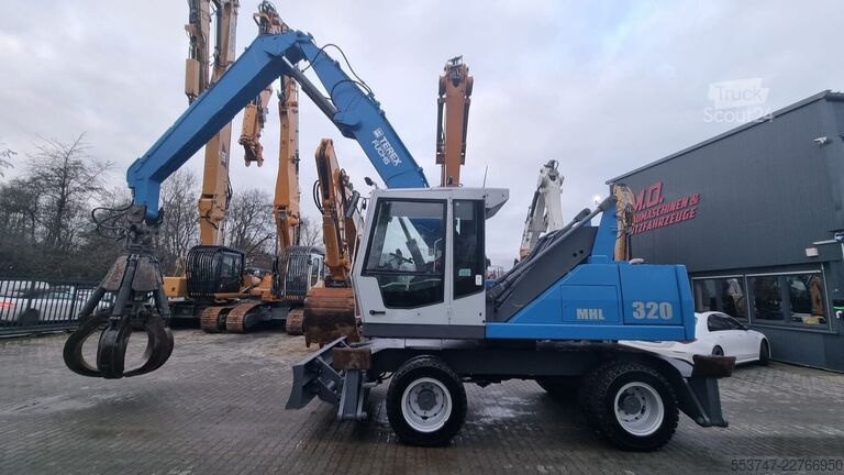 Підйомно-транспортна машина Fuchs MHL 320