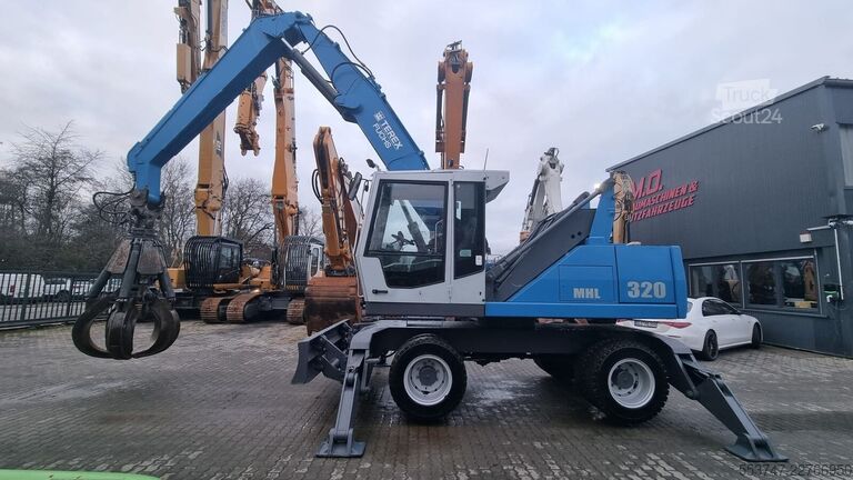 Підйомно-транспортна машина Fuchs MHL 320