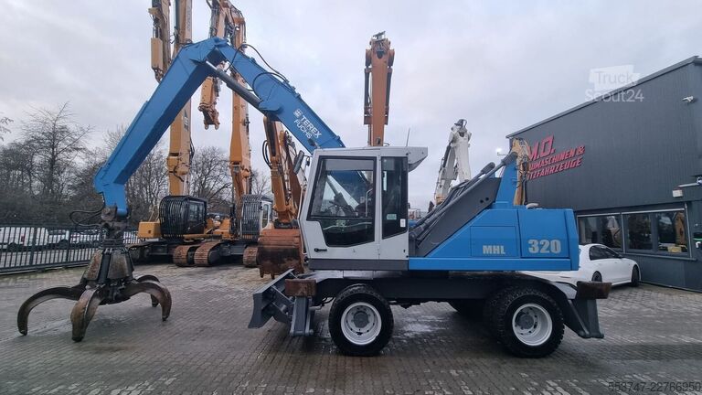 Підйомно-транспортна машина Fuchs MHL 320