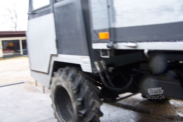 Samonakladalna prikolica Bucher BUCHER