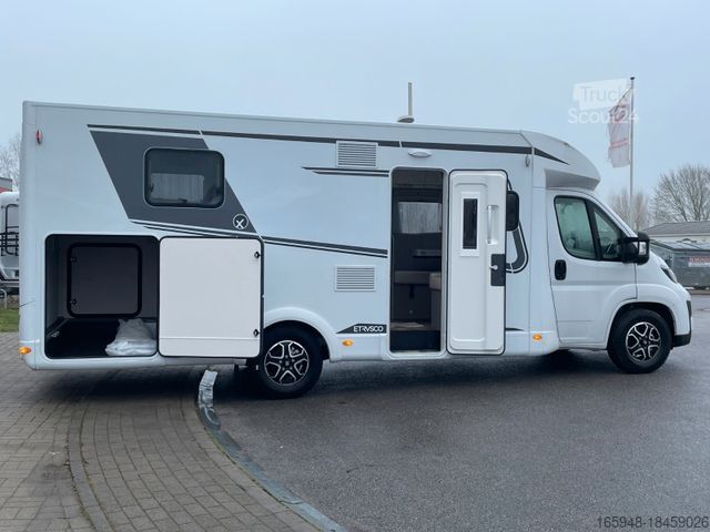 Полуинтегрированный автодом ETRUSCO T 7400 QBC MJ 25 *Queensbett**Automatik*
