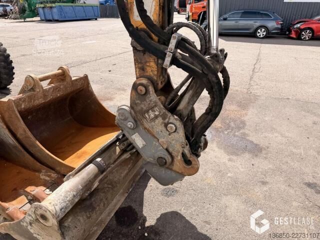 Экскаватор-погрузчик Liebherr A912 COMPACT