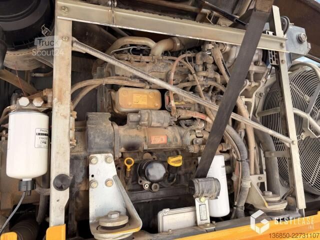 Экскаватор-погрузчик Liebherr A912 COMPACT