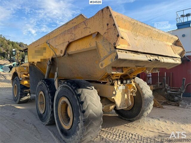 Pašizgāzējs Volvo A25D 6x6 articulated hauler with white registratio