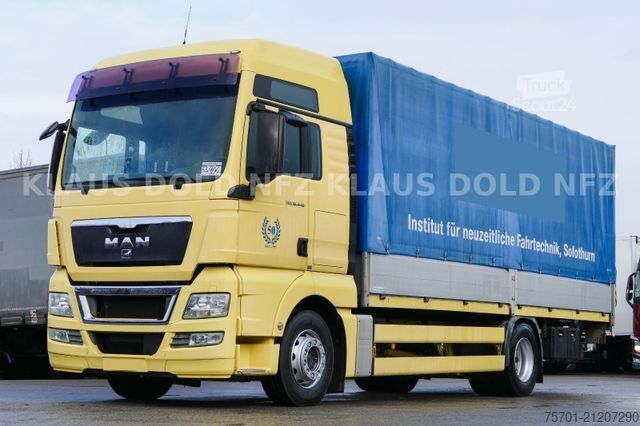 Flatbed truck with tarp MAN TGX 18.440 Pritsche Plane Bordwände LBW Euro 5