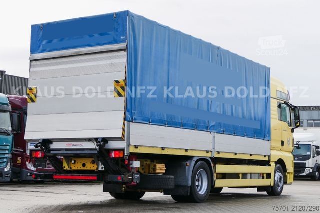 Flatbed truck with tarp MAN TGX 18.440 Pritsche Plane Bordwände LBW Euro 5