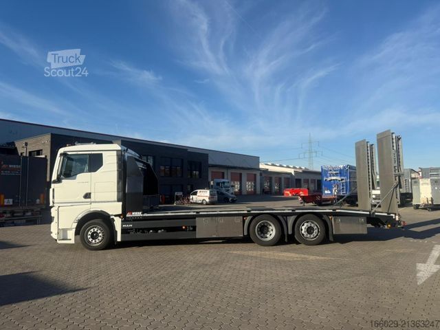 Ladbil med lad MAN TGX 26.440 6x2-4 LL Maschinen Transporter