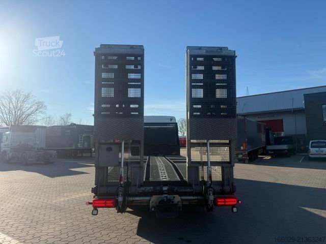 Ladbil med lad MAN TGX 26.440 6x2-4 LL Maschinen Transporter