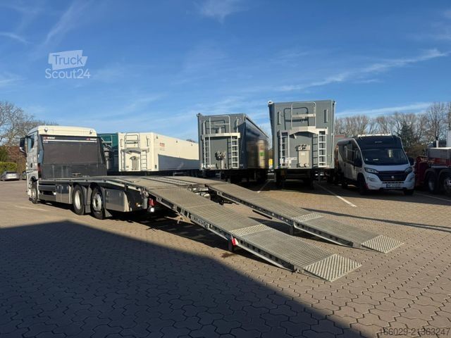 Ladbil med lad MAN TGX 26.440 6x2-4 LL Maschinen Transporter