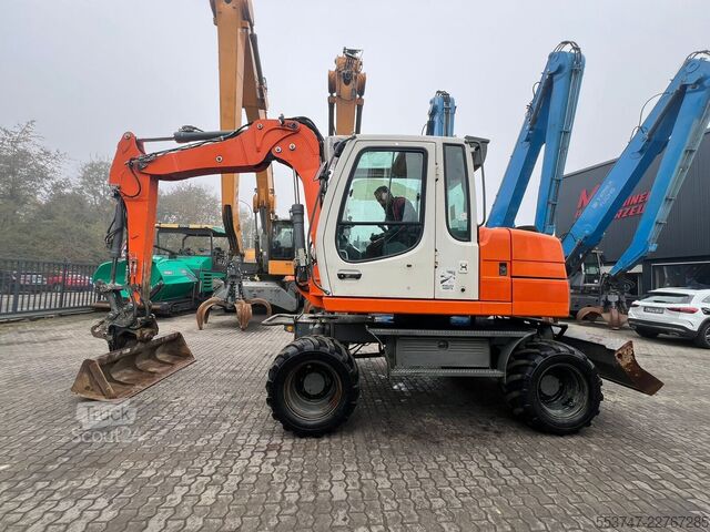 Kolesové rýpadlo Liebherr A 311 Litronic