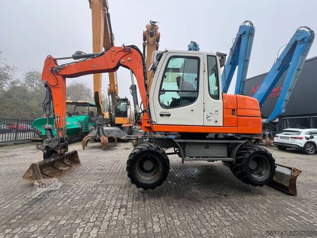 Kolesové rýpadlo Liebherr A 311 Litronic