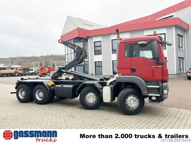 Abrollkipper MAN TGS 35.400 8x4 BL, Schub-Knick bis 6,5m Container
