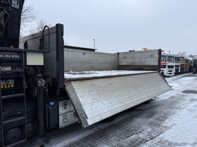 Camión volquete Volvo FM410 8X4 Kipper mit Kran HIAB 244-5