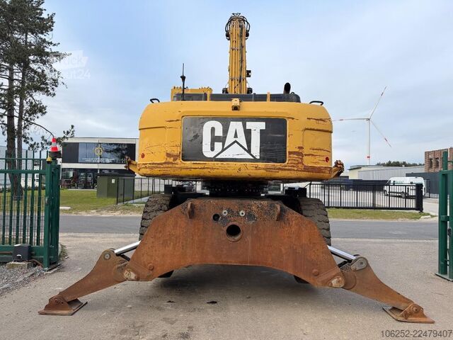 Підйомно-транспортна машина Caterpillar M 325 D OVERSLAGKRAAN / MATERIAL HANDLER / UMSC...