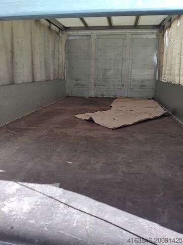 Nissan NT 400 camion cu platformă fixă Nissan nt 400