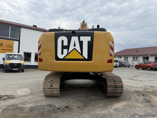 Lánctalpas kotrógép Caterpillar 323 FL