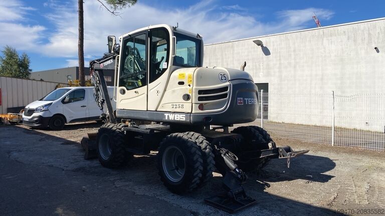 Kolový bagr Terex Tw 85 Schaeff with 3 buckets and forks