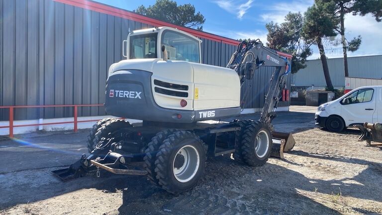 Kolový bagr Terex Tw 85 Schaeff with 3 buckets and forks