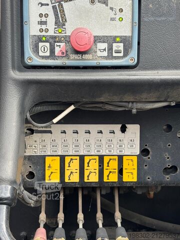 Grúa autocargante y sistema de gancho Man TGS 33.320