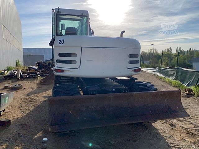 Bager na kolesih Terex TW110 with two-piece offset boom and 3 buckets