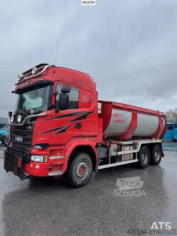 Tipper Scania R730 6x4 snow plow–equipped tipper truck with unde