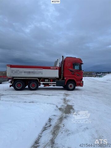 Tipper Scania R730 6x4 snow plow–equipped tipper truck with unde