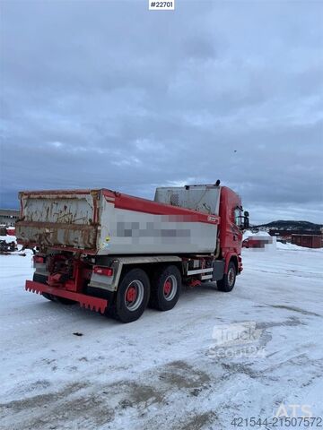 Tipper Scania R730 6x4 snow plow–equipped tipper truck with unde