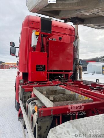 Tipper Scania R730 6x4 snow plow–equipped tipper truck with unde