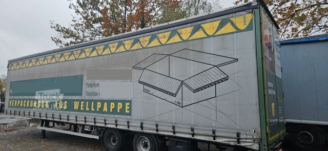 Auflieger mit Pritsche & Plane Krukenmeier KRUKENMEIER