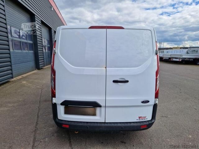 Transporter mit Koffer Ford Transit CUSTOM 6 PLACES
