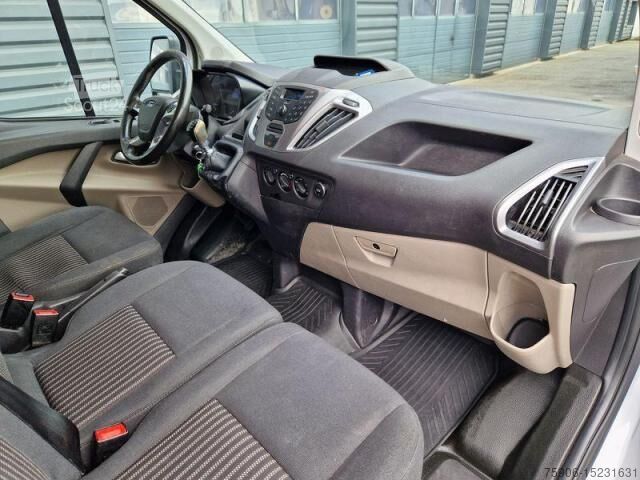 Transporter mit Koffer Ford Transit CUSTOM 6 PLACES