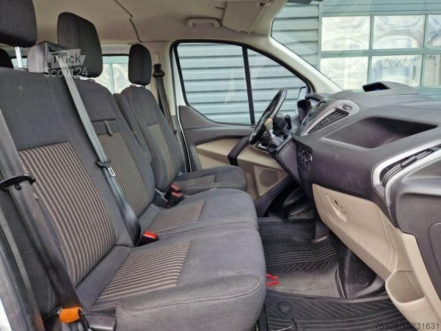 Transporter mit Koffer Ford Transit CUSTOM 6 PLACES