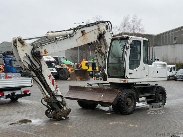 Excavadora sobre neumáticos Liebherr A 904 C LITRONIC KOPARKA KOŁOWA